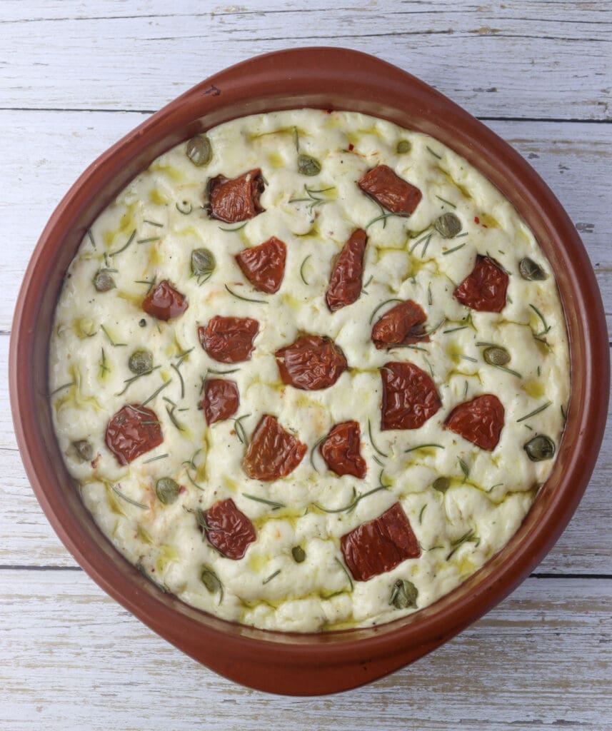 how to add sun dried tomatoes, capers, rosemary and coarse salt to focaccia dough